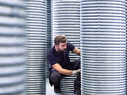 CERTUSS employee works on coils